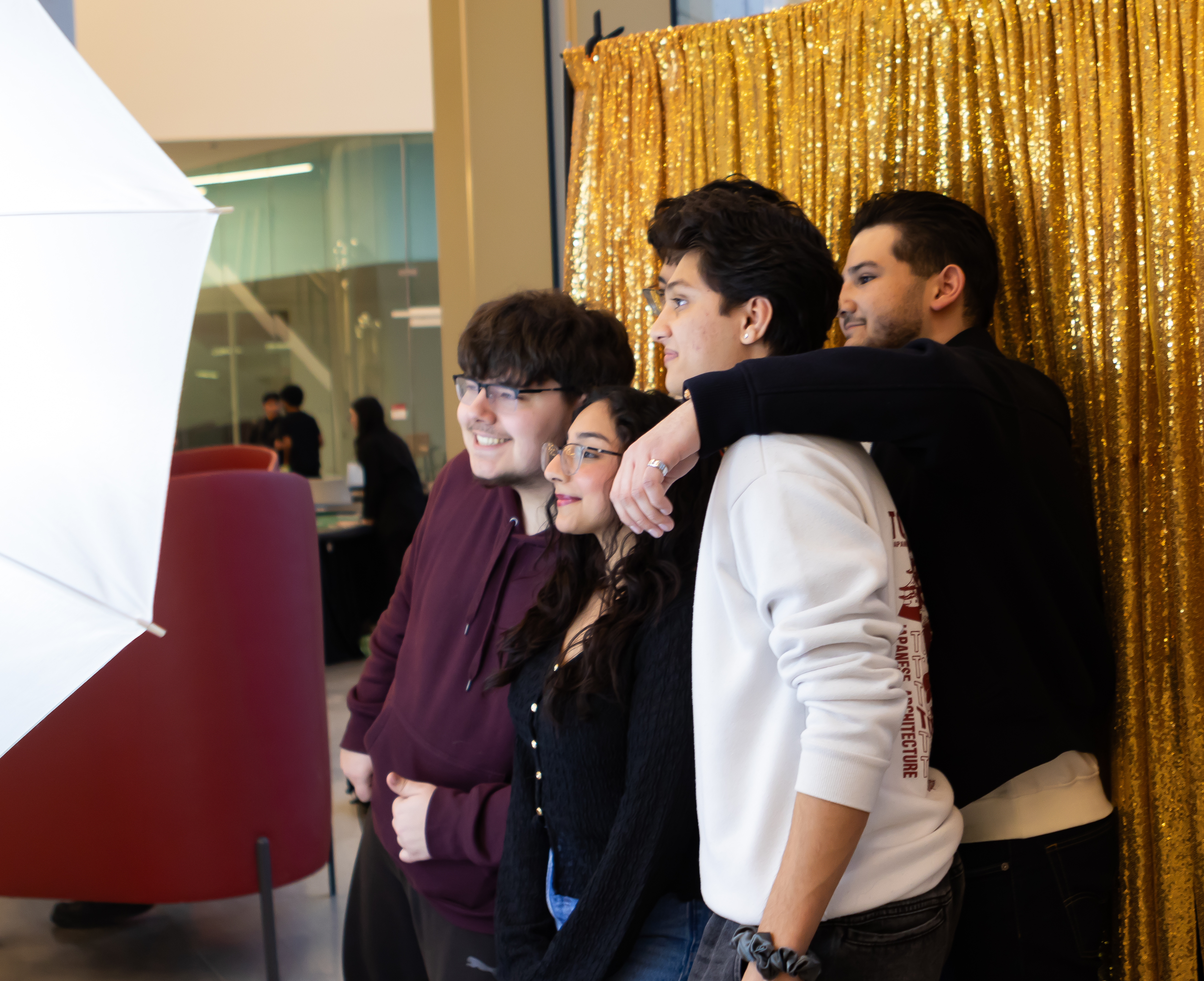 Group of people getting photo taken at photo booth